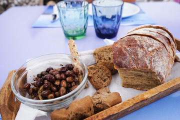 Olives and bread is a traditional Greek food served before the main course.