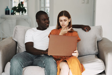 couple using laptop