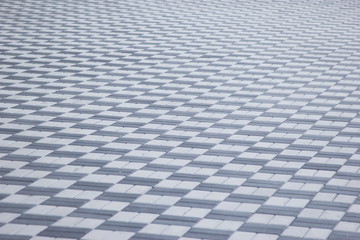 Fototapeta premium asphalt gray-white tile, textured surface