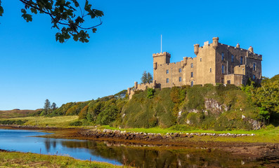 Dunvegan, Scotland / United Kingdom - August 25, 2014: The Dunvegan Castle on the shore of Loch Dunvegan