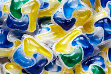 Colorful dishwasher tablets background