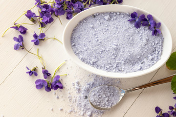 Fototapeta na wymiar viola sugar violetta odorata sugar crystals for decorating baking cupcakes fresh lilac spring edible fragrant flower