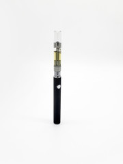 Fototapeta premium Vape Pen. Cannabis oil vape pen cartridges. Alternative method of smoking the THC extracted from marijuana plants.