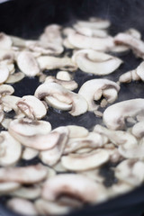 Frying champignon mushroom