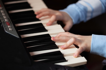 Fototapeta premium hands playing piano