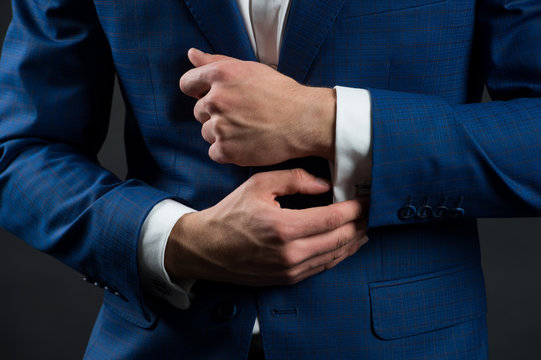 Perfect to last detail. Getting dressed. Formal suit shirt and cuffs. Wearing formal style. Fashion and style. Formal clothes. Dress code. Wedding ceremony. Holiday celebration. Formal and classy