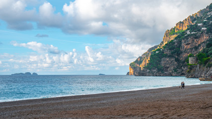 Positano beach with a old tower in the background
