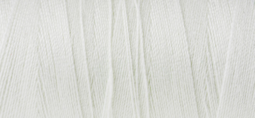 Closeup of thread wound on spool.