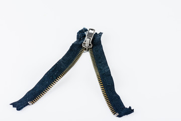 Obraz premium Closeip of old jeans zipper.