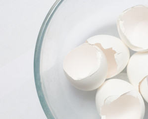 Fototapeta na wymiar white eggshell on a light background