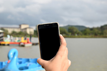 hand holding mobile phone