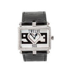 Silvery rectangular watch with diamonds and a heart on the dial and with a black leather strap, front view isolated on white background