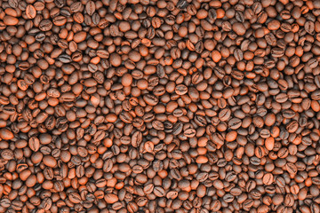 Roasted coffee beans background. Brown coffee beans texture