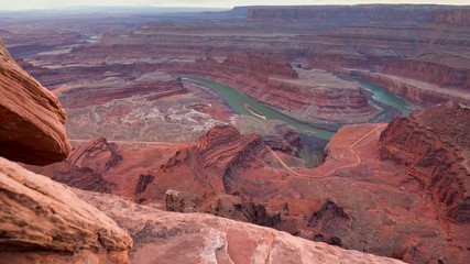 Dead Horse Point State Park, Utah, USA. Сamera moves over a cliff, view of canyon and colorado river. Steadicam shot, 4K