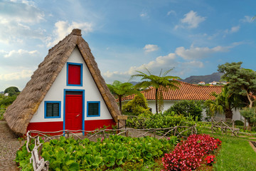 Fototapeta na wymiar Madeira island, Portugal. Rural landscape with traditional house, Santana.
