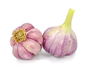 Raw garlic on a white background, white vegetables Placed on a white background Used for cooking