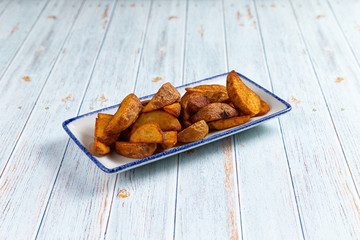 fried potato wedges on a plate