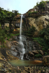 Naklejka na ściany i meble Beautiful Long Exposure of Ramboda Waterfall Nuwaraeliya, Central Province, Sri Lanka