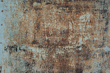 The background the size of rusty metal with elements of light colors