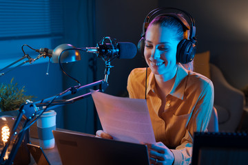 Young radio presenter broadcasting news