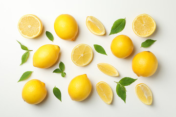 Flat lay with lemons on white background. Fresh fruit