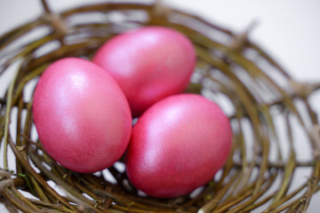 pink easter egg on a white background. easter decoration. colored eggs
