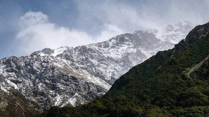 Fototapeta na wymiar Detail on snowstorm happening on alpine peak. Shot at Aoraki / Mt Cook National Park, New Zealand