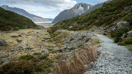 Panoramic view on mountain trail leading to valley, shot at Aoraki / Mt Cook National Park, New Zealand