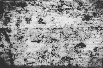 Abstract monochrome background with scratches, lines and paint spots.