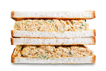 Canned Tuna salad sandwiches on a white isolated background