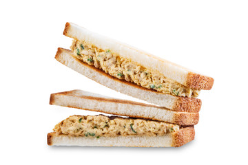 Canned Tuna salad sandwiches on a white isolated background