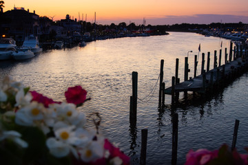 Sunset view overlooking the canal and pier from drawbridge in historic Lewes, Delaware