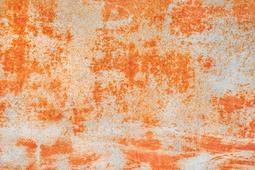 Old metal texture with abstract rusty pattern, corrosive orange background