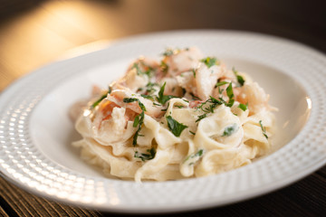 Italian pasta on a white plate