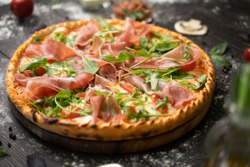 Italian cuisine. Pizza with various toppings.