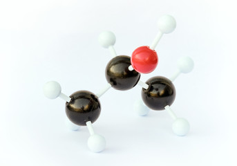 Plastic ball-and-stick model of an isopropyl alcohol (isopropanol) molecule against a white...