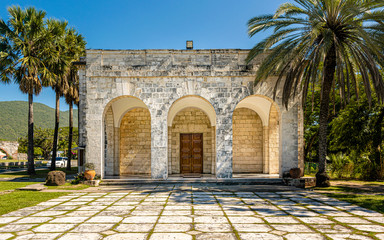 Stone Cathedral with Tropical plants and Clear Blue Sky