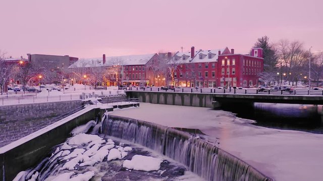 Winter Drone Shot Over Downtown Dover New Hampshire Waterfall During Sunset