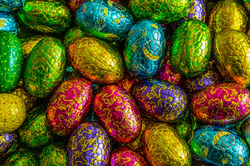 Fototapeta na wymiar Easter chokolate eggs, different color. Chokolate candy.