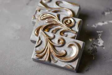 handmade soap in the form of a plaster cast with carved ornament. Huge bar of soap