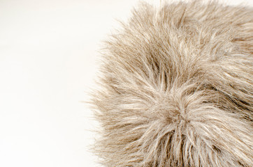 Abstract background of warm gray-brown fur closeup