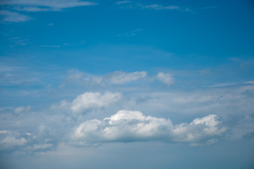 Naklejka na ściany i meble white cloud on a blue sky