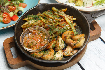 fried potatoes with mushrooms