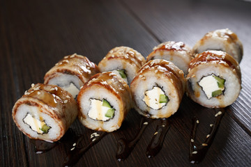 Sushi set on a dark brown table