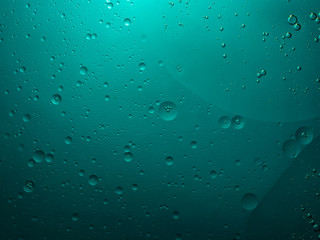 Abstract bubble background in green. Slightly blurred.