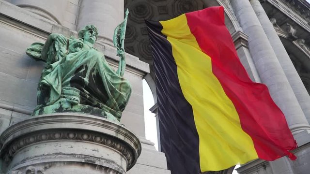 Belgium flag against tricolour stripes waving on wind from Arcade du Cinquantenaire 1920X1080 HD footage (1080p 100fps FullHD video)