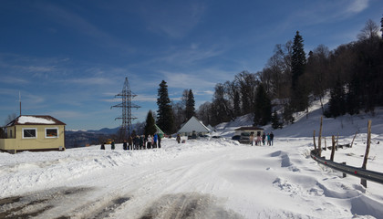 Beautiful mountains covered with snow. Sunny day and blue sky on a frosty day