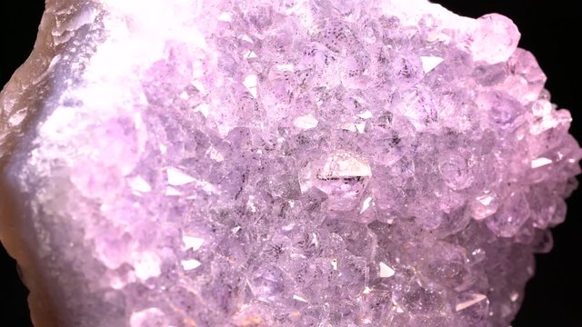 Quartz also called deep quartz filmed in studio in front of black background in Marco mode 