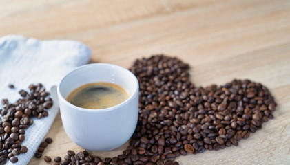 cup of coffee with beans