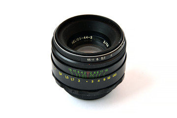 Old Helios 44-2 photo lens on a white background Isolated photographic equipment